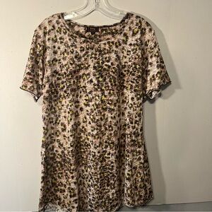 Rising International dress size large sheer material and uneven hem